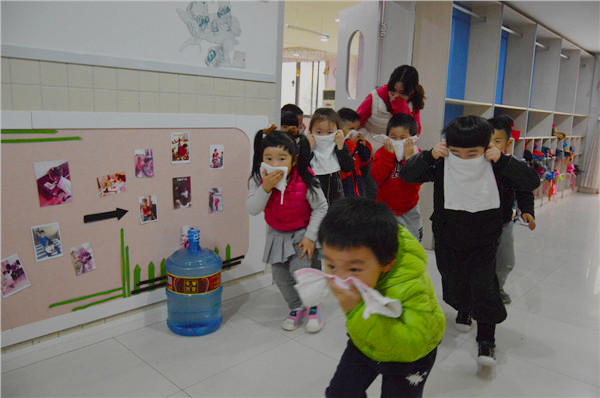 锦园幼儿园开展“关注消防 平安你我”防火演练活动